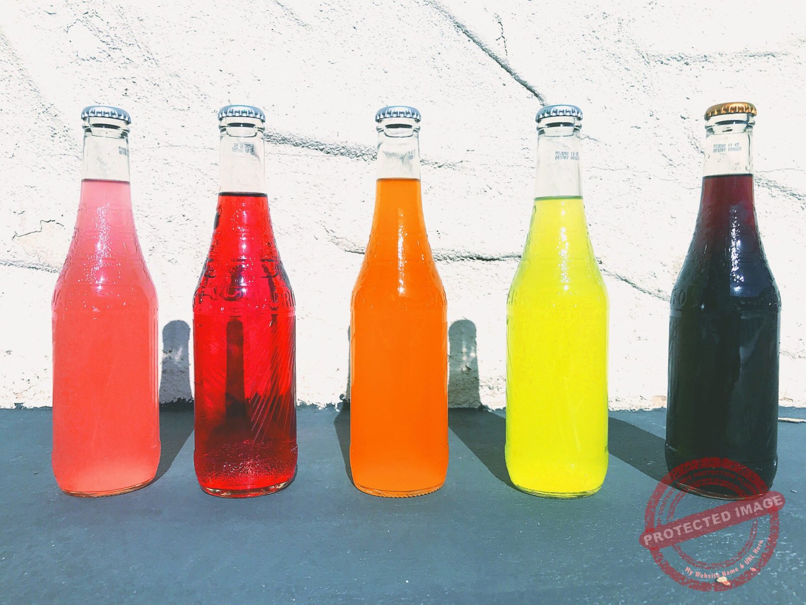 sofa-pop-bottles-in-a-row