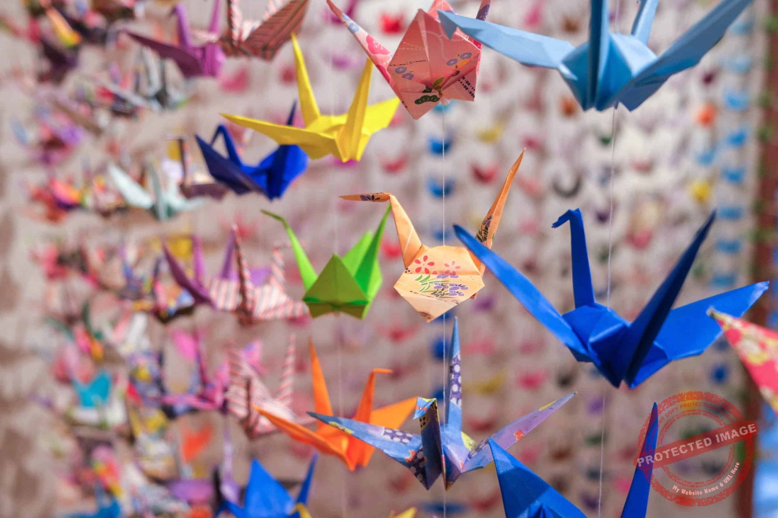 thousands-of-colorful-origami-cranes-symbolizing