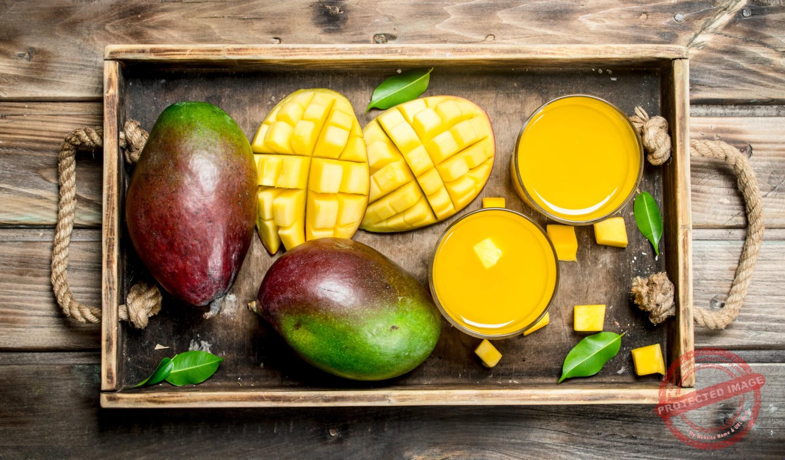 Mango juice in a glass on tray